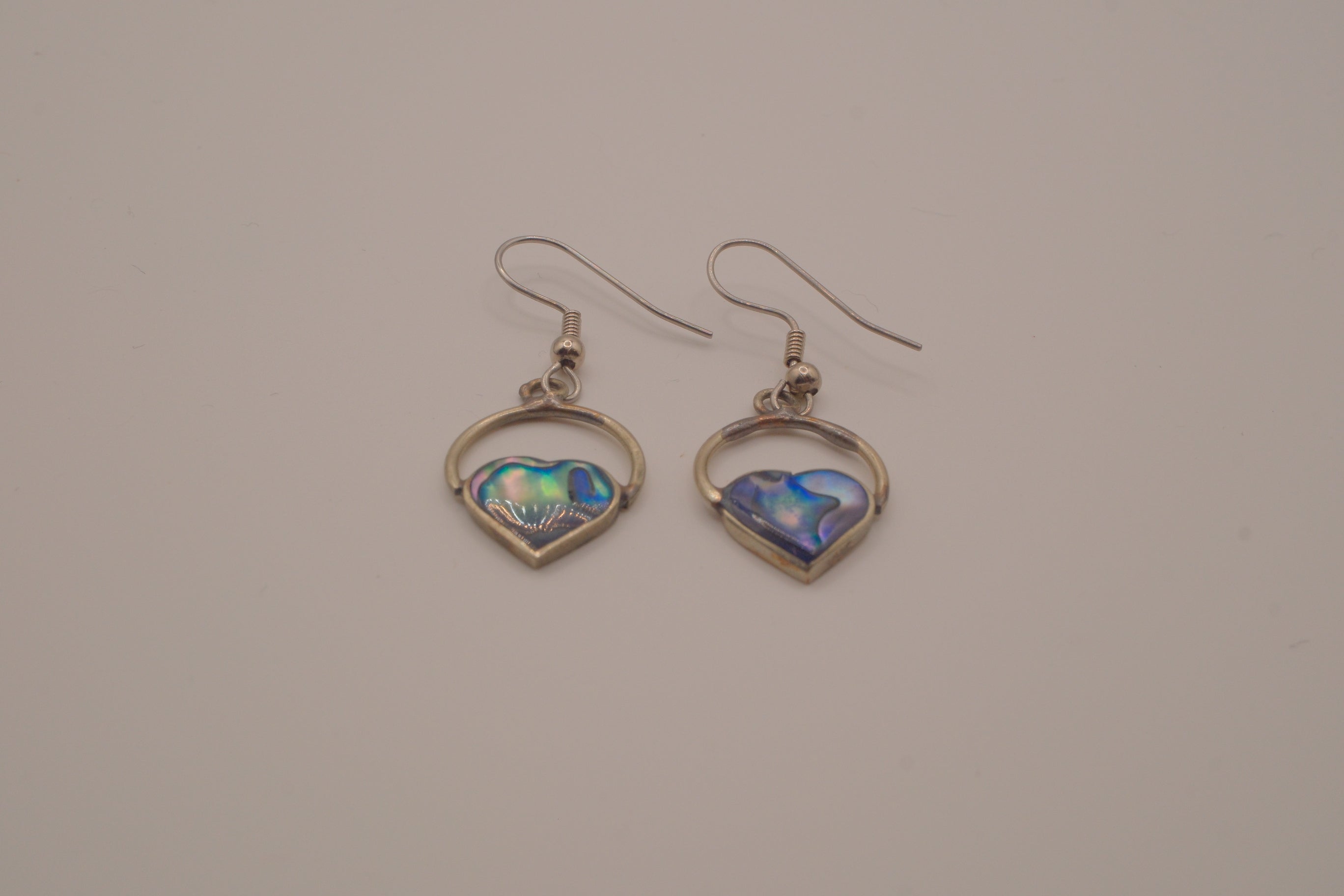 Heart-shaped abalone shell drop earrings