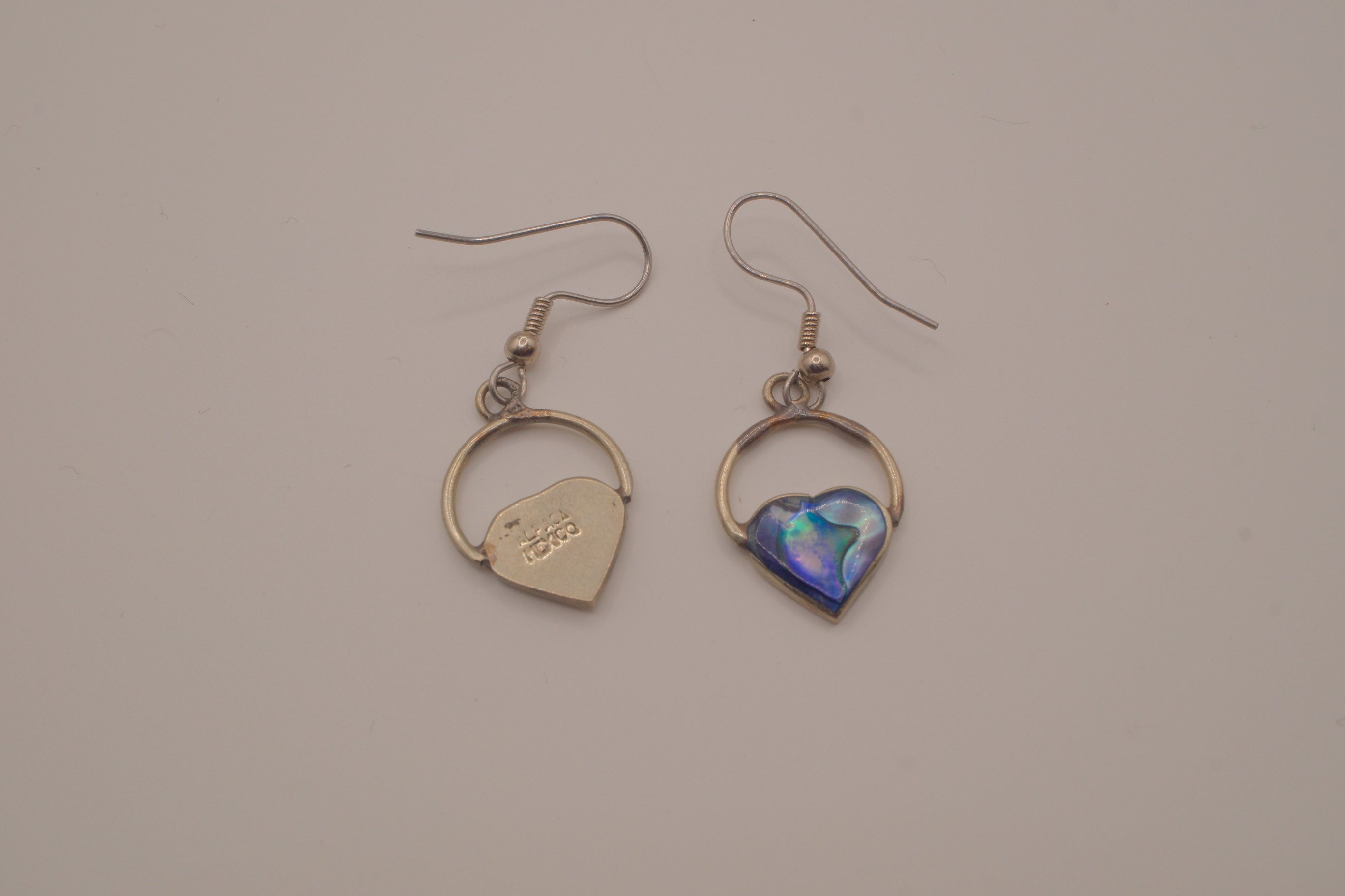 Heart-shaped abalone shell drop earrings