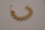 Vintage 1950s rhinestone and faux pearl leaf bracelet
