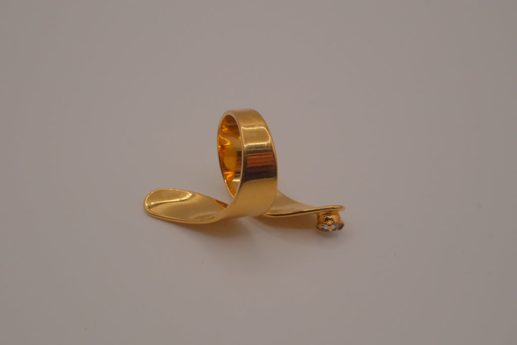 Adjustable gold wrap-around statement ring