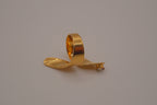 Adjustable gold wrap-around statement ring