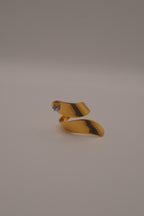 Adjustable gold wrap-around statement ring