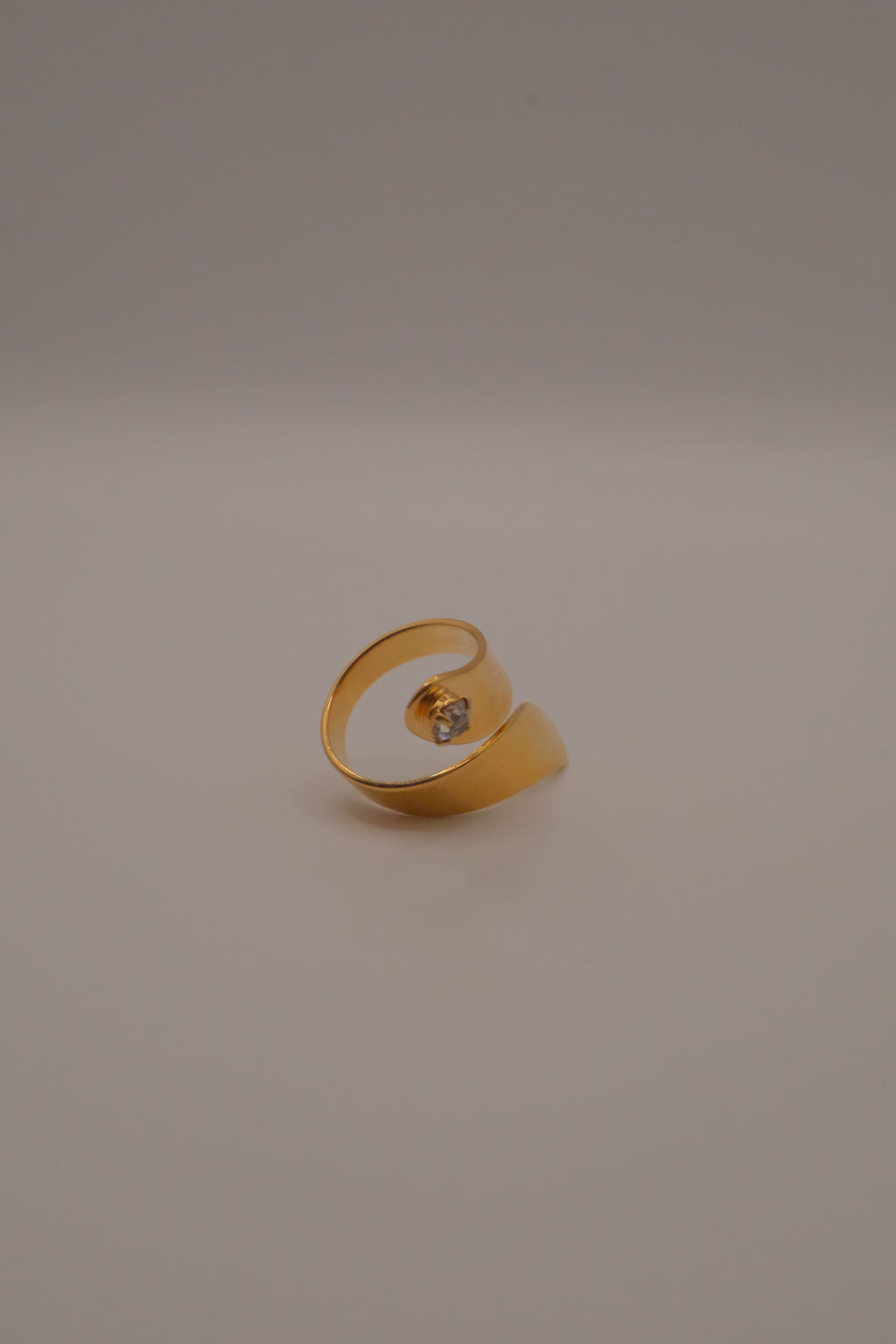 Adjustable gold wrap-around statement ring