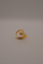 Adjustable gold wrap-around statement ring