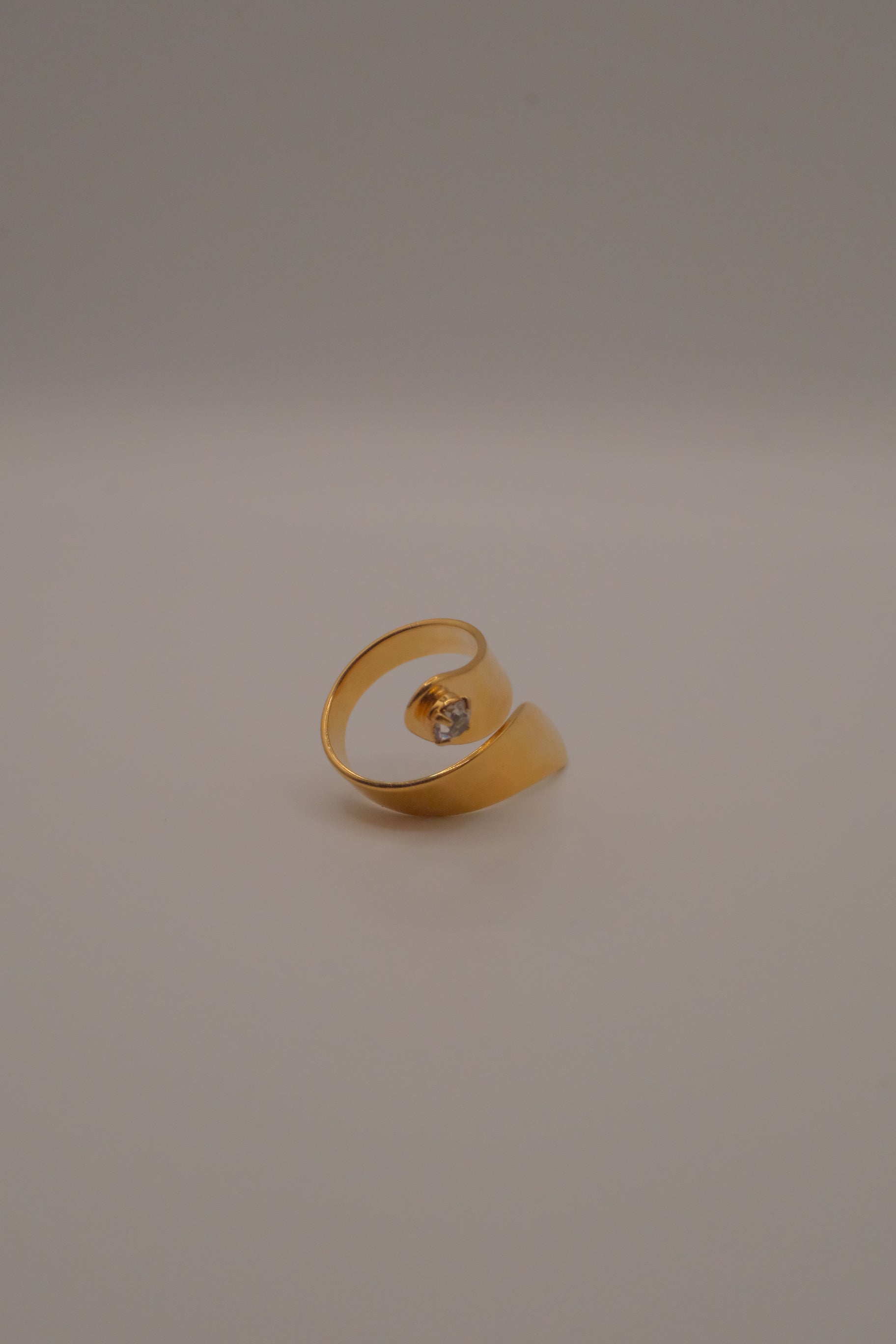 Adjustable gold wrap-around statement ring