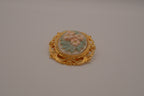 Vintage porcelain floral cameo brooch
