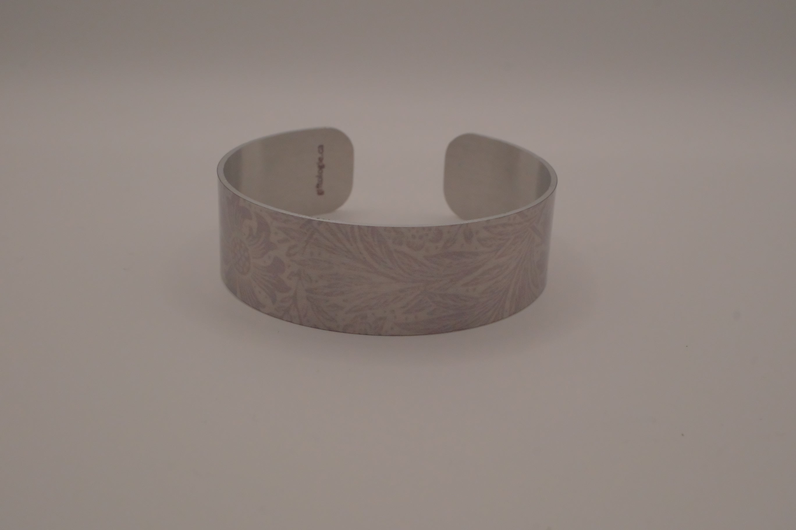 Embossed silver-tone floral cuff bracelet