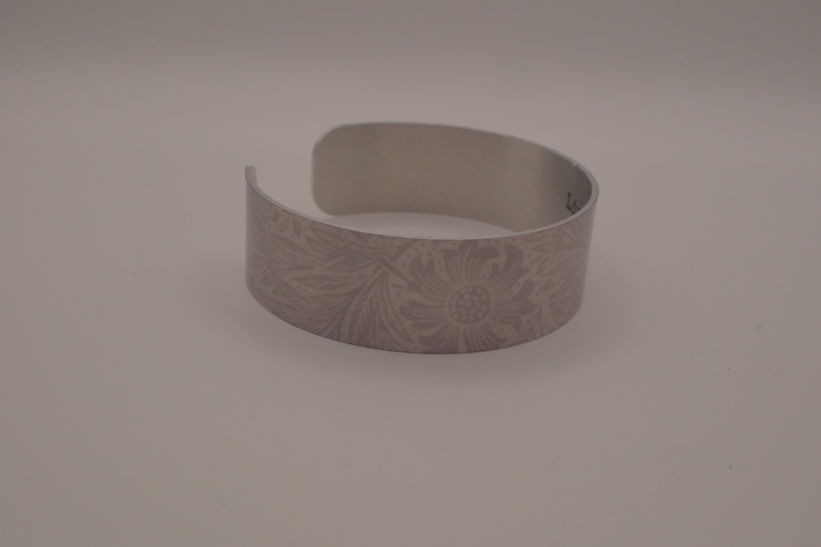 Embossed silver-tone floral cuff bracelet