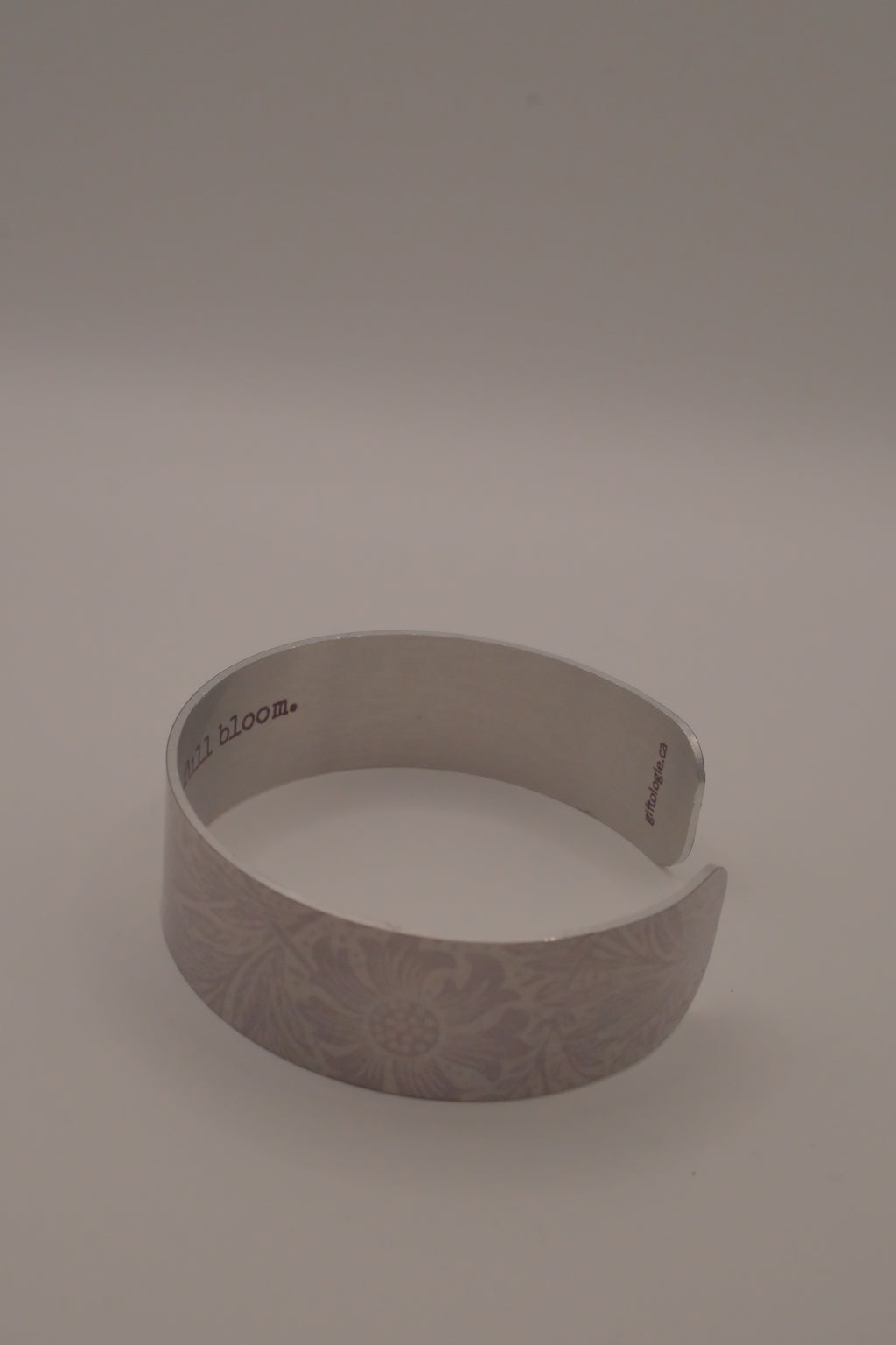 Embossed silver-tone floral cuff bracelet