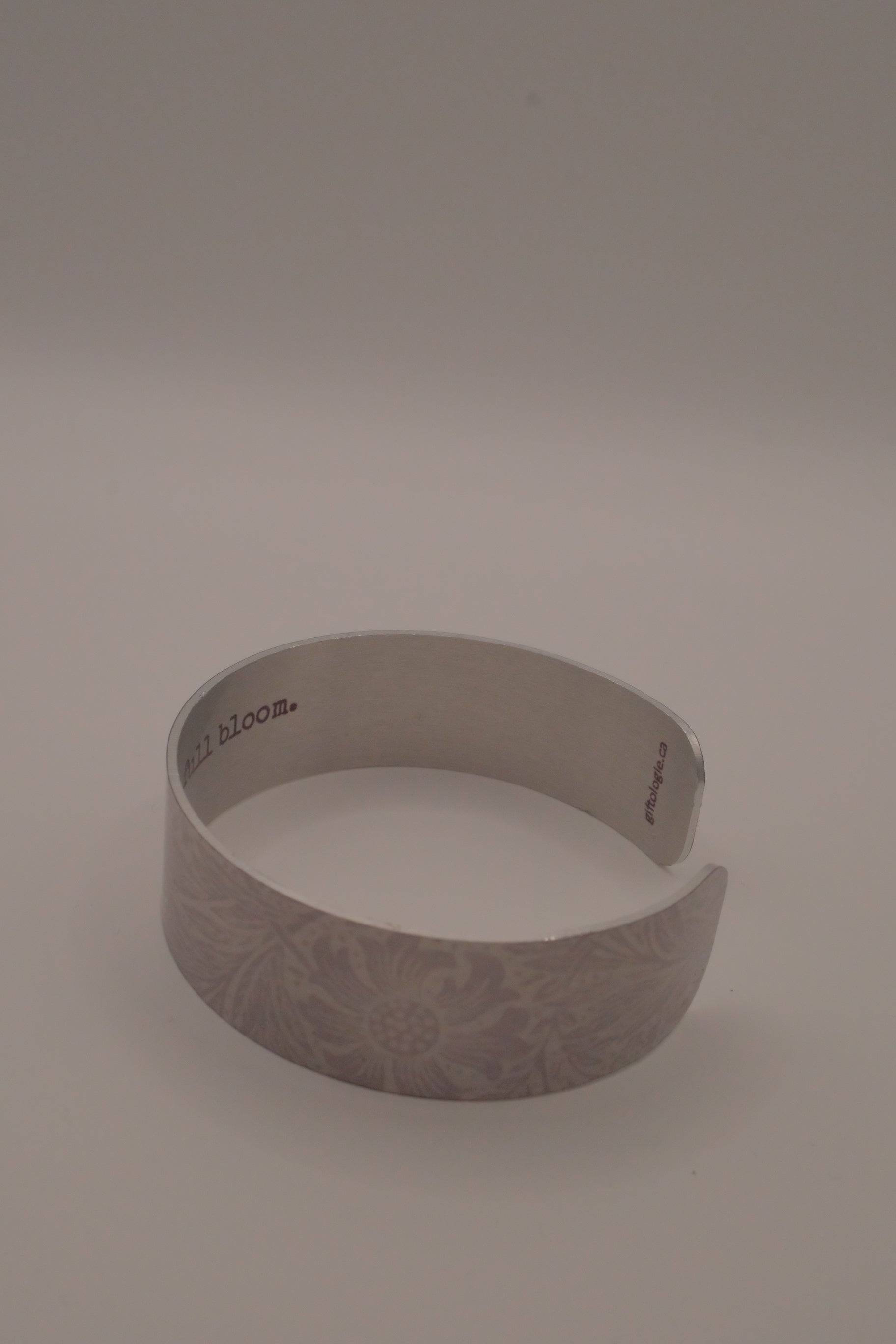 Embossed silver-tone floral cuff bracelet