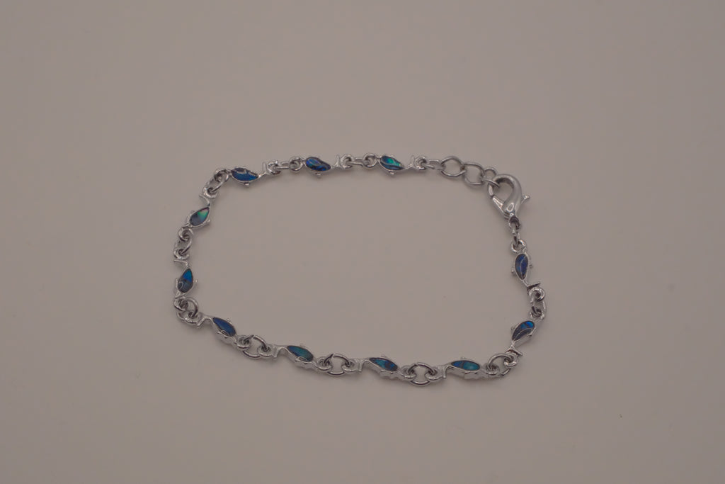 Dainty dolphin-link charm bracelet with Abalone inlay