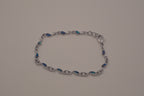 Dainty dolphin-link charm bracelet with Abalone inlay