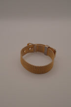 Vintage 1970s Avon gold-tone mesh belt buckle bracelet