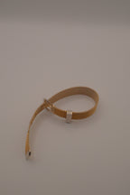Vintage 1970s Avon gold-tone mesh belt buckle bracelet