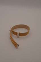 Vintage 1970s Avon gold-tone mesh belt buckle bracelet