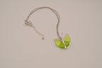 Vintage Avon Green flights of fancy butterfly necklace