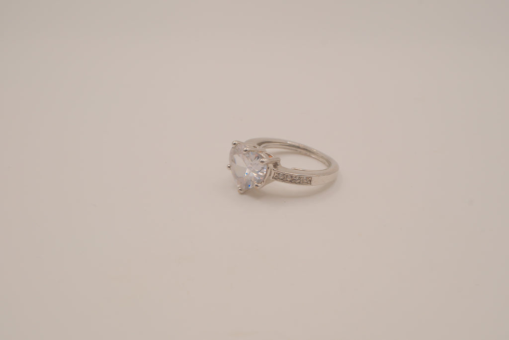 Heart-shaped solitaire engagement ring