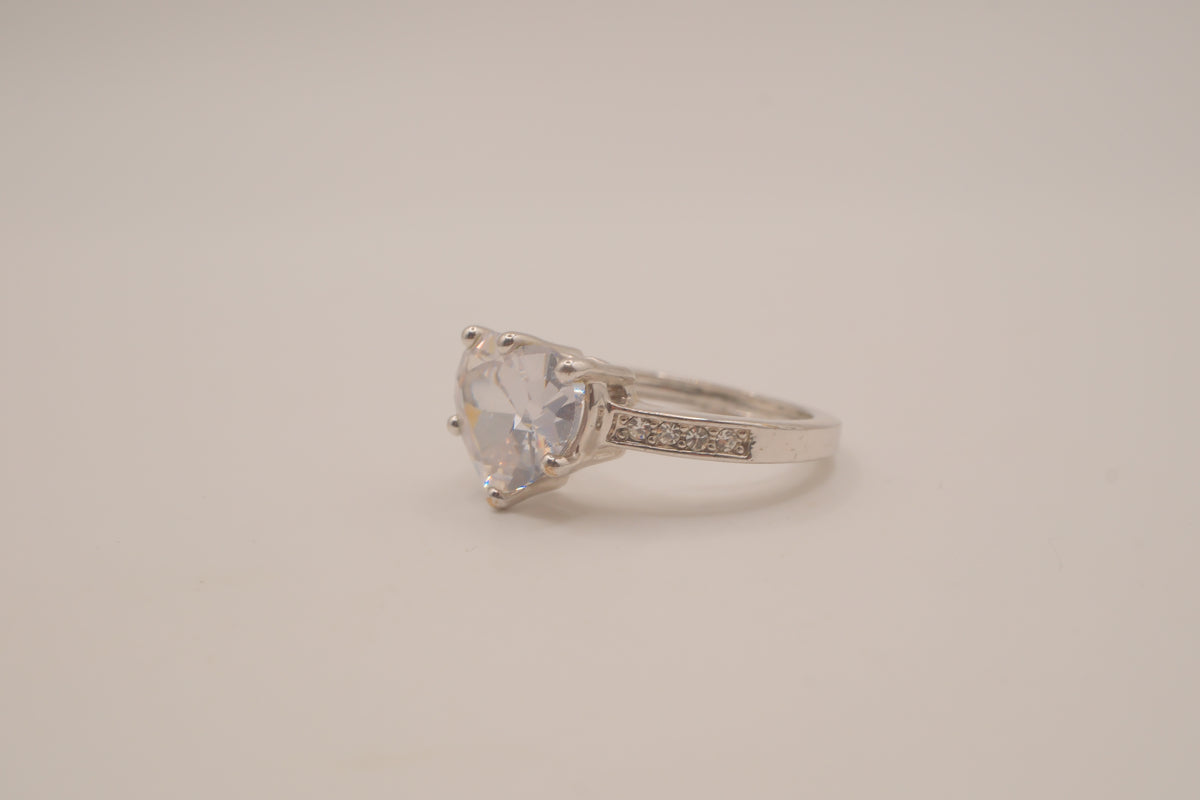Heart-shaped solitaire engagement ring