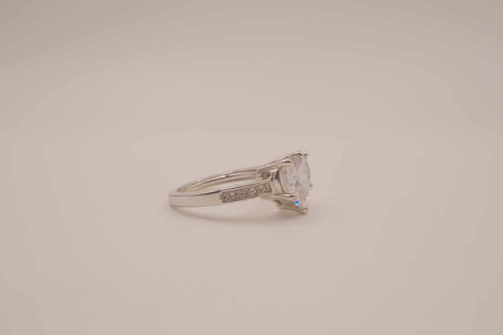 Heart-shaped solitaire engagement ring