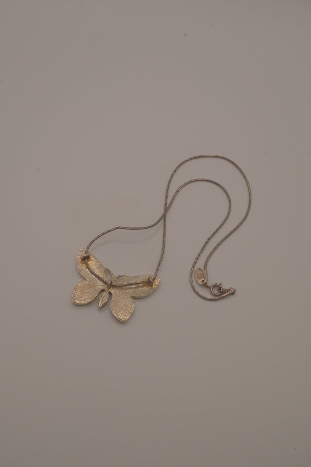 Vintage asymmetrical butterfly pendant necklace