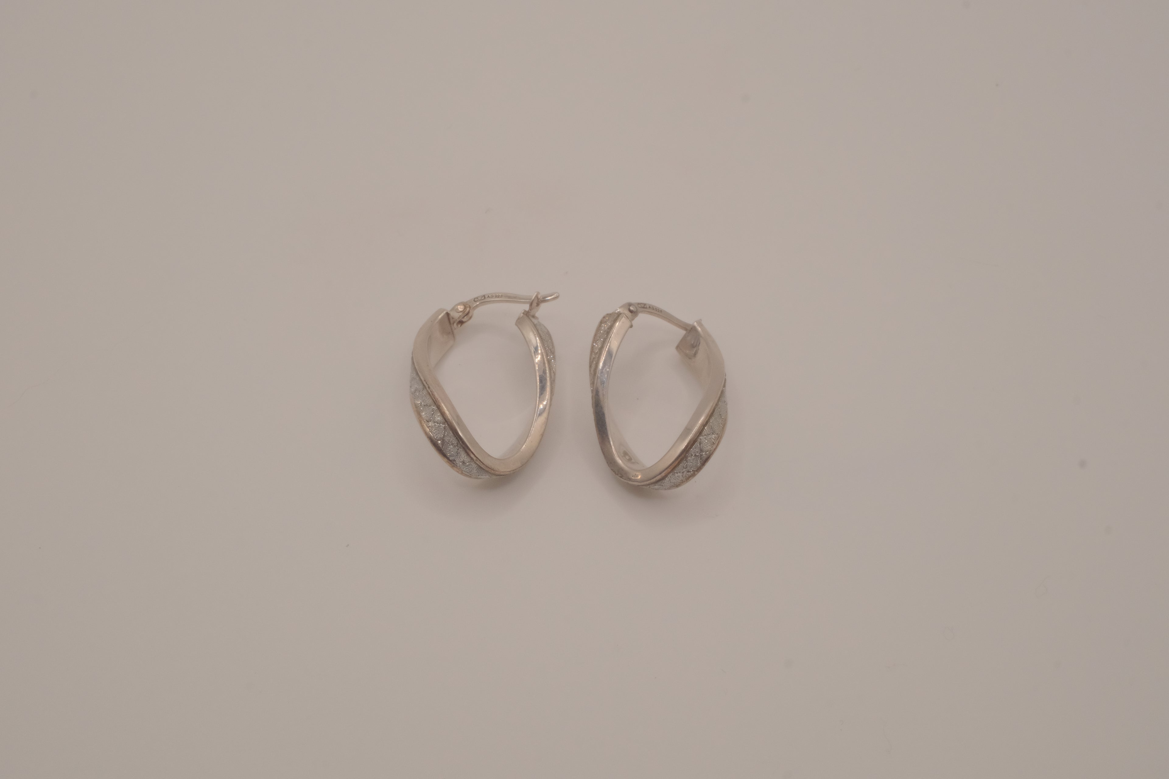 Sterling silver twist swirl glitter hoop earrings