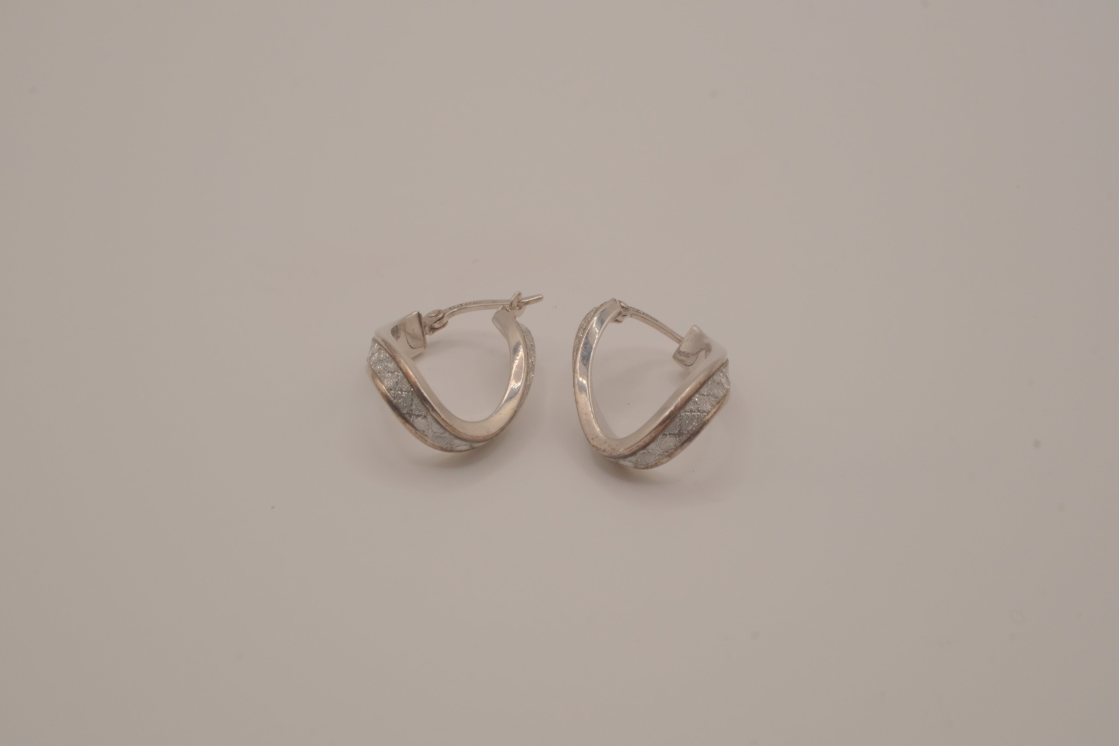 Sterling silver twist swirl glitter hoop earrings