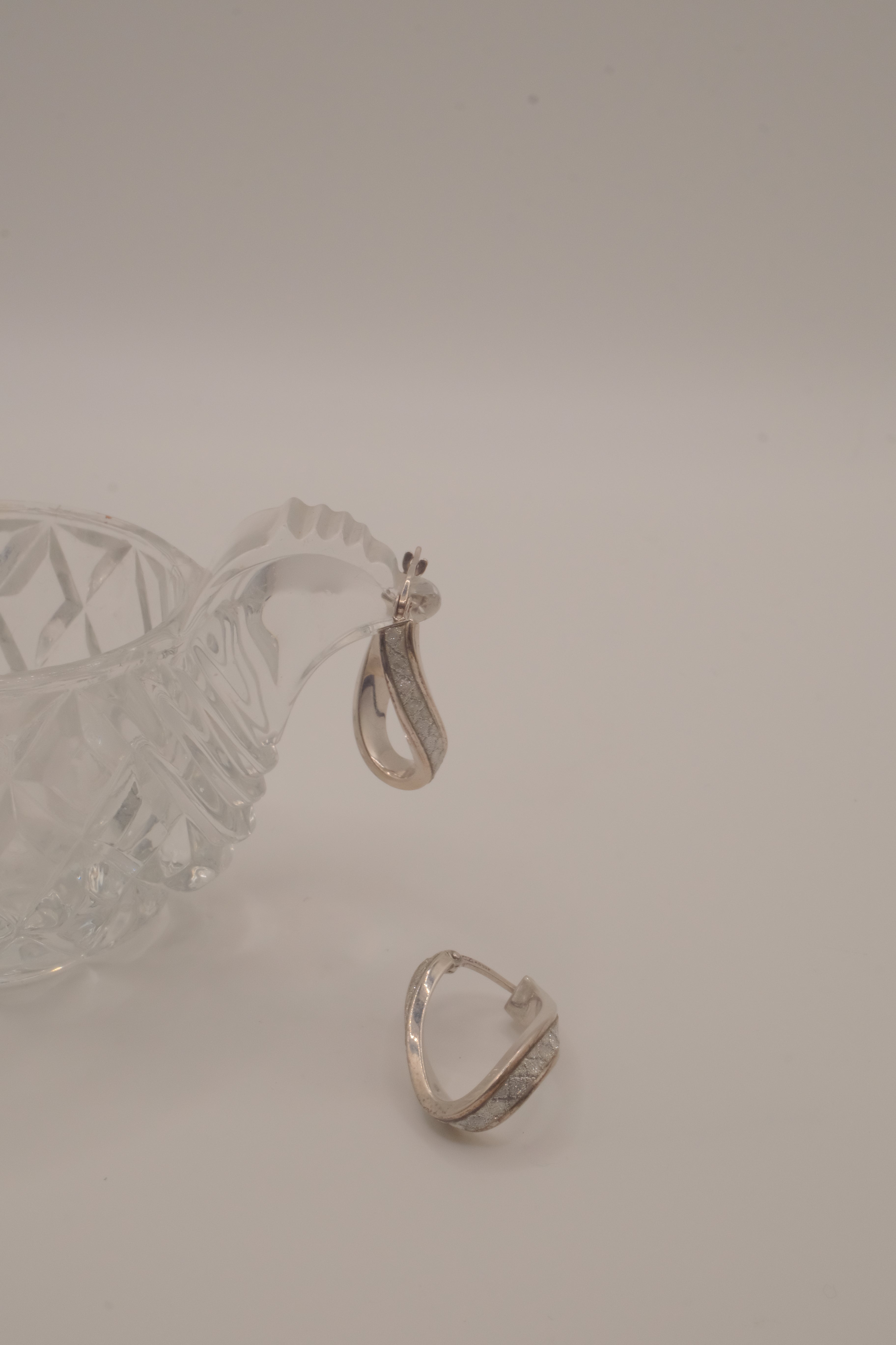 Sterling silver twist swirl glitter hoop earrings