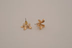 Gold tone flower stud earrings