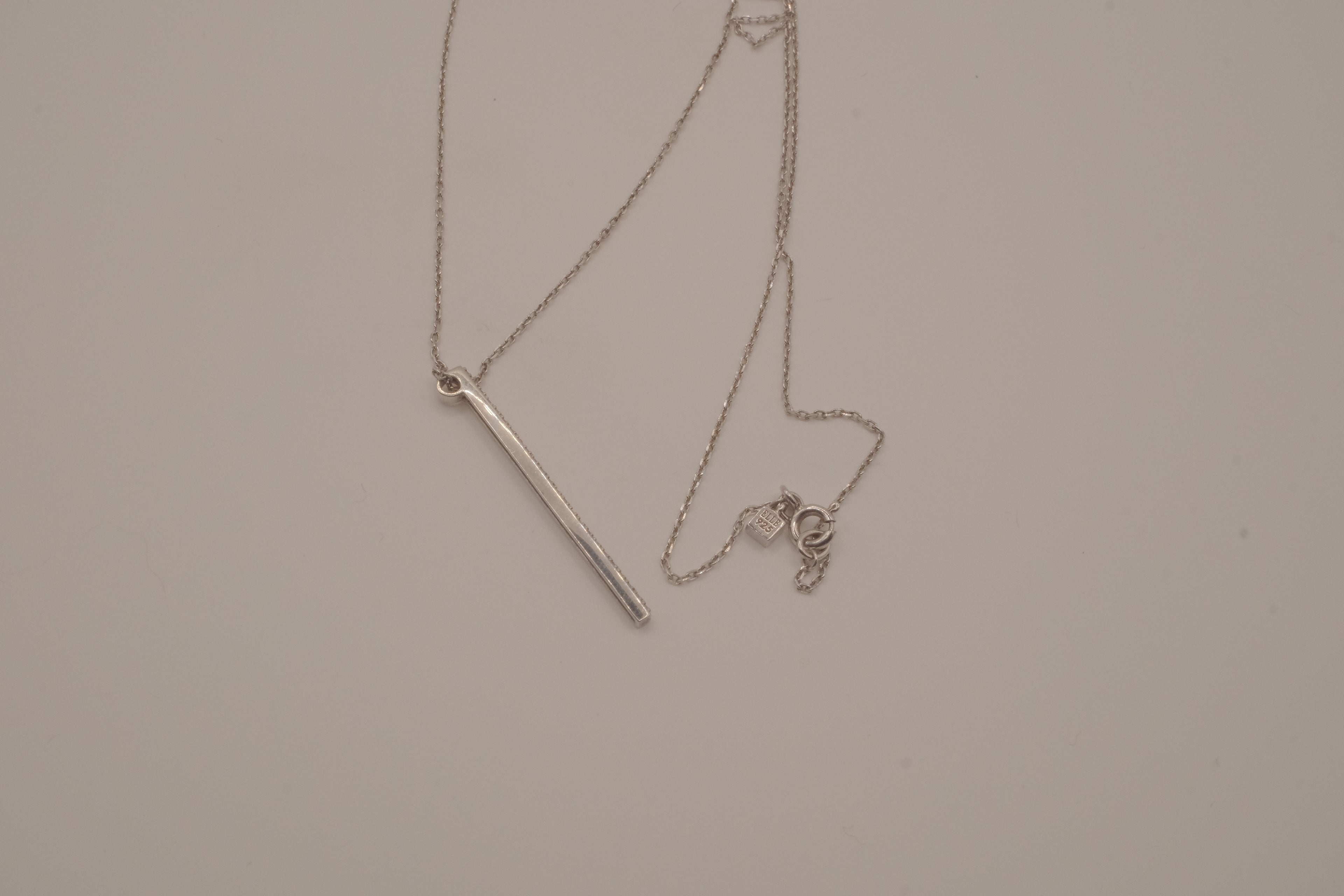 Sterling silver vertical diamond bar pendant necklace