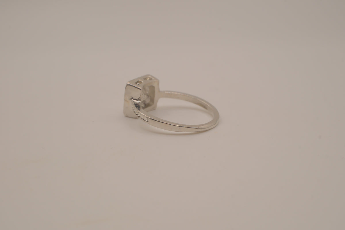 Silver tone square halo ring