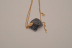 Avon snowflake obsidian pendant necklace