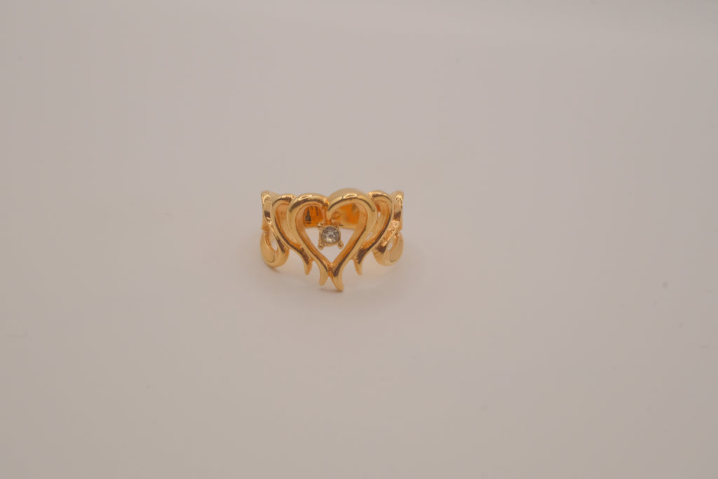 Gold openwork heart ring