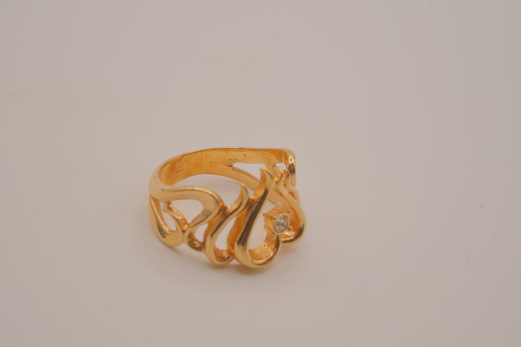 Gold openwork heart ring