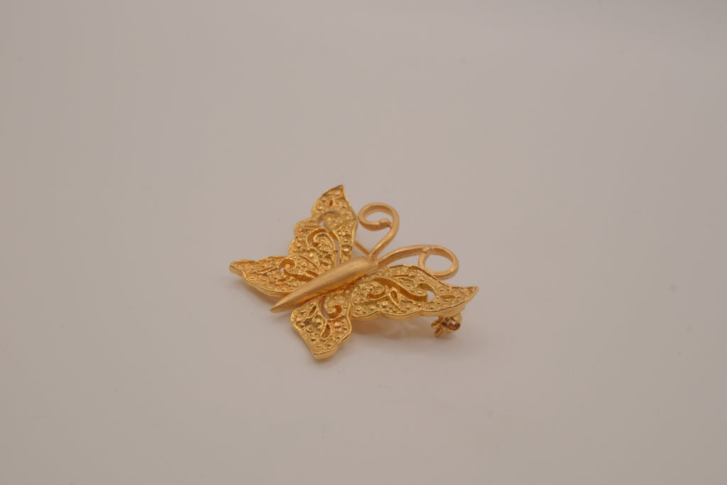 Vintage textured filigree butterfly brooch