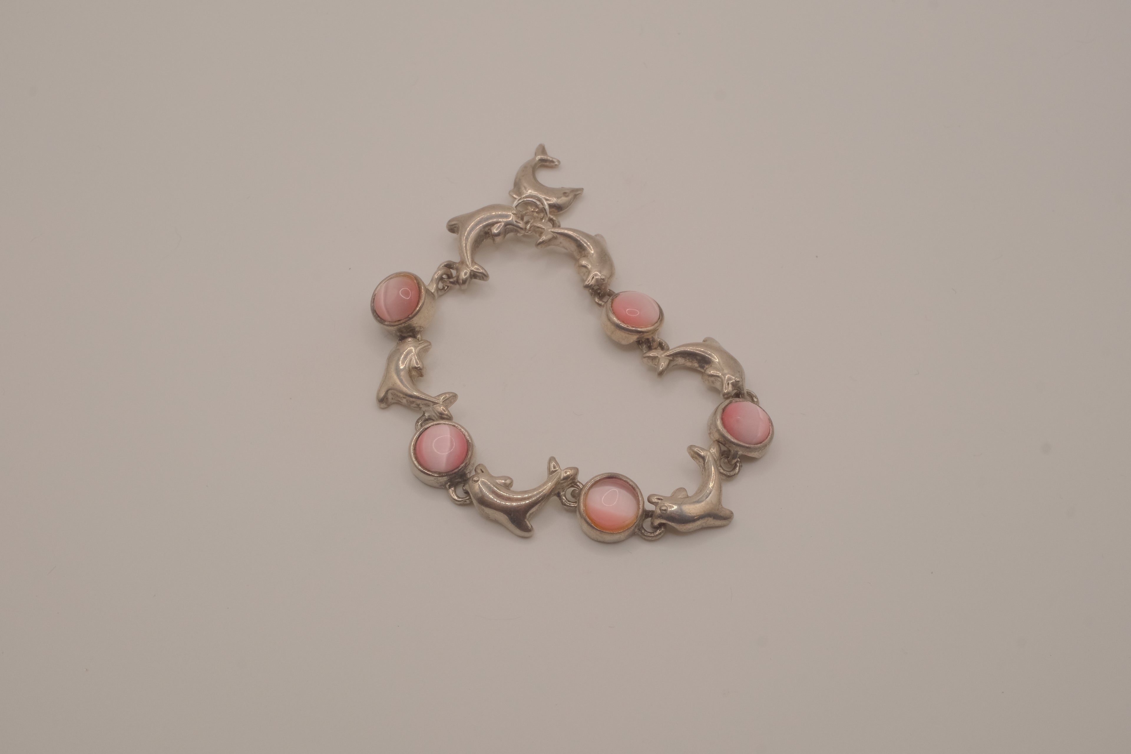 Reworked dolphin and Pink stones link bracelet