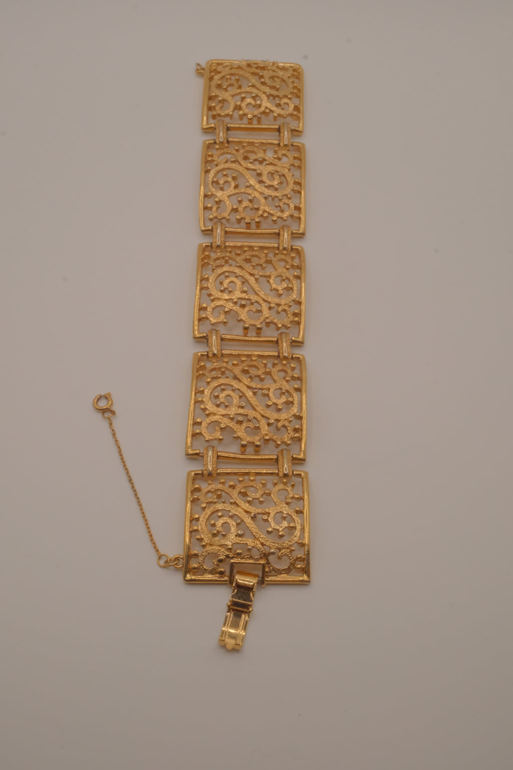 Vintage wide gold-tone openwork scroll panel link bracelet