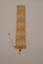 Vintage wide gold-tone openwork scroll panel link bracelet