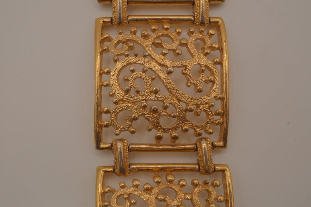 Vintage wide gold-tone openwork scroll panel link bracelet