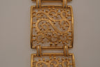 Vintage wide gold-tone openwork scroll panel link bracelet