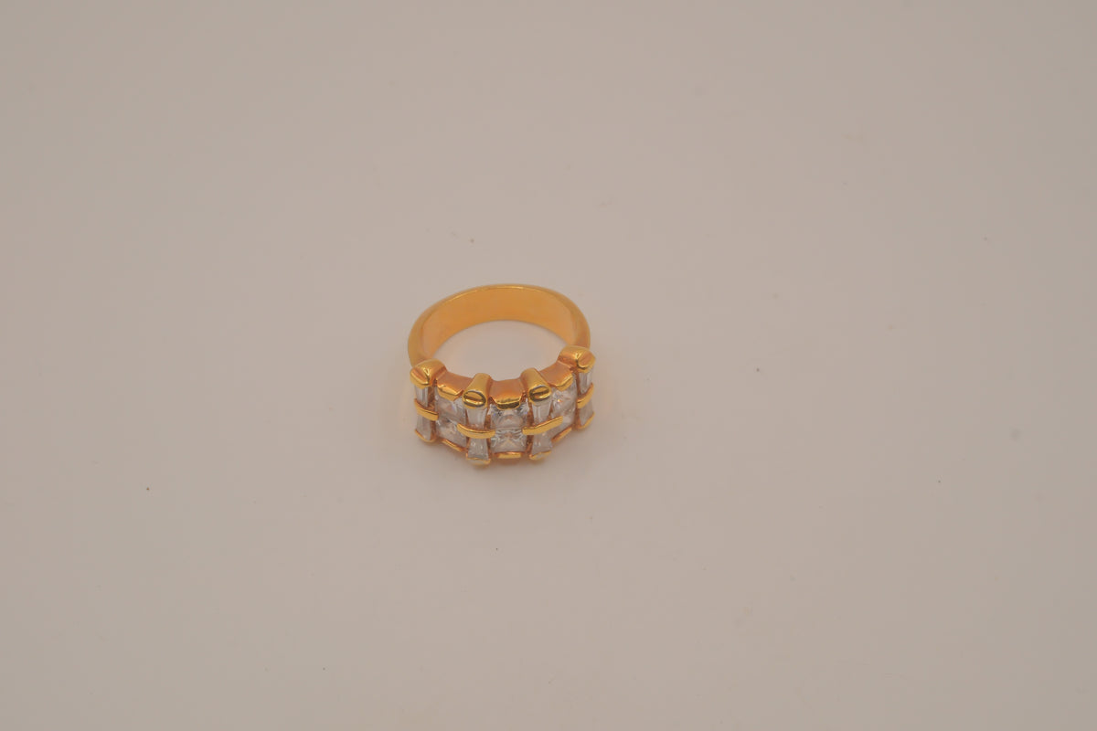 Gold tone multi-row baguette cut statement ring