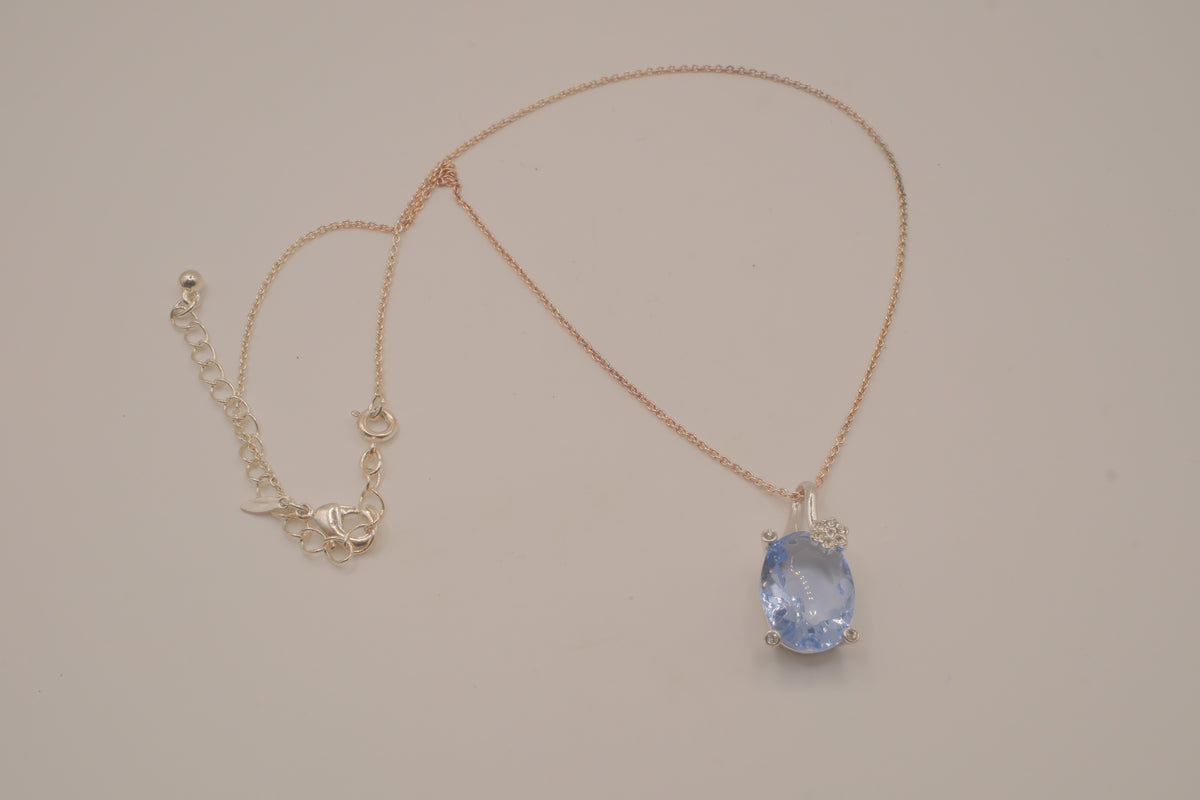 Vintage Avon light blue stone flower pendant necklace