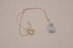 Vintage Avon light blue stone flower pendant necklace