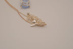 Vintage Avon light blue stone flower pendant necklace