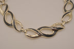 Vintage gold-tone infinity link enamel necklace