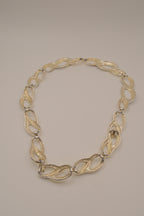 Vintage gold-tone infinity link enamel necklace