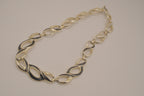 Vintage gold-tone infinity link enamel necklace