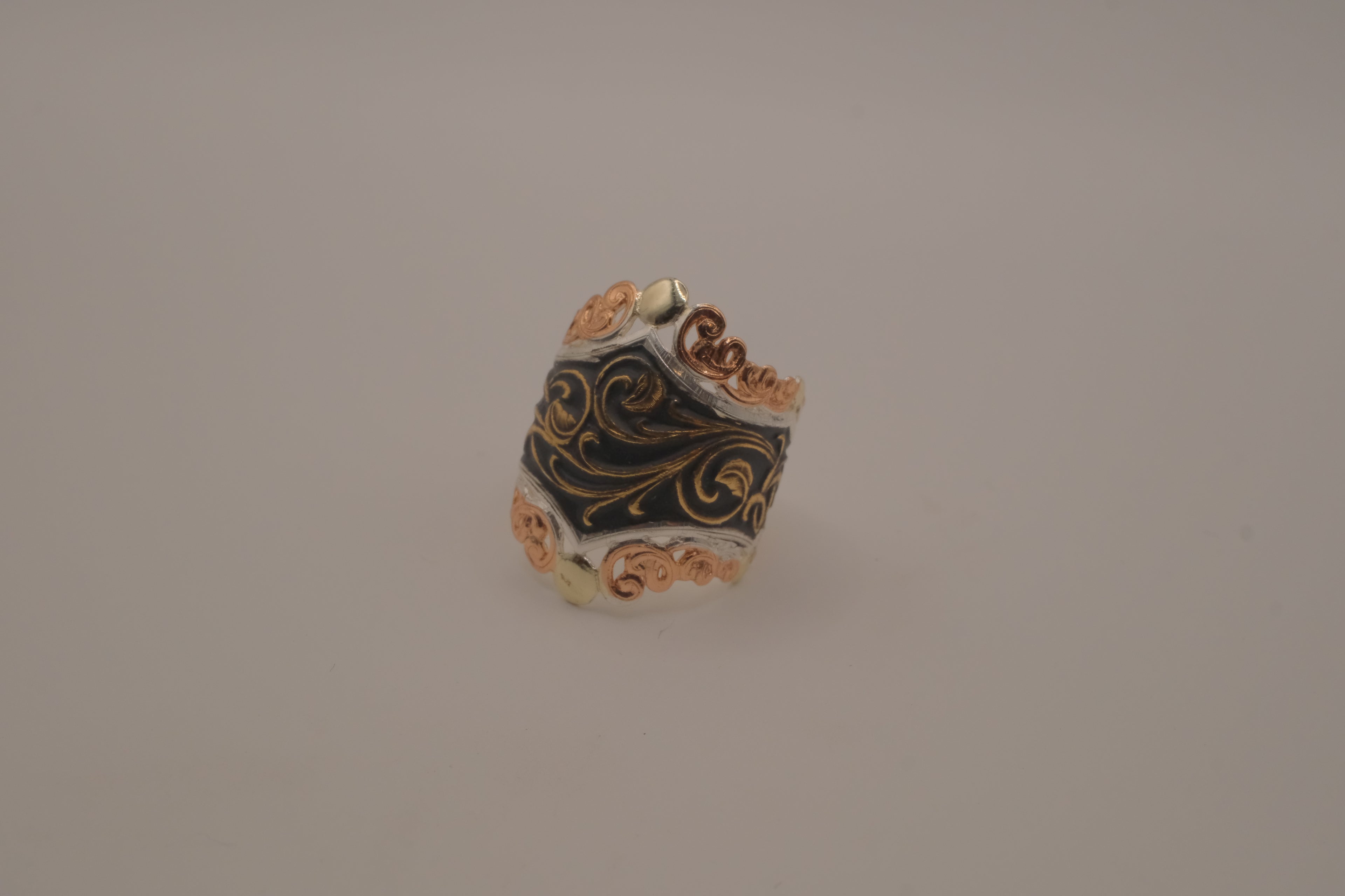 Reworked hand-engraved scrollwork ring