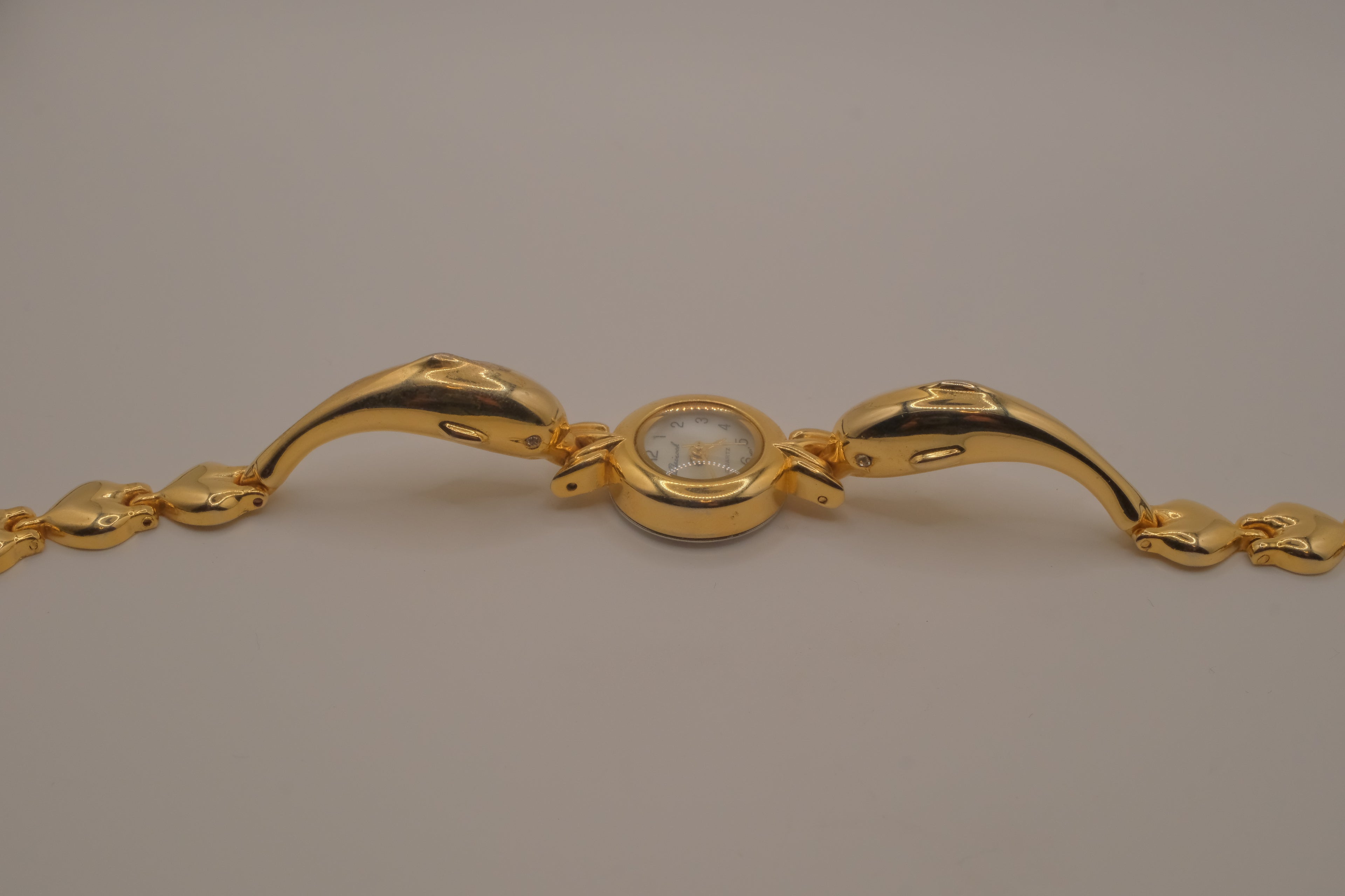 Vintage-style dolphin bracelet watch