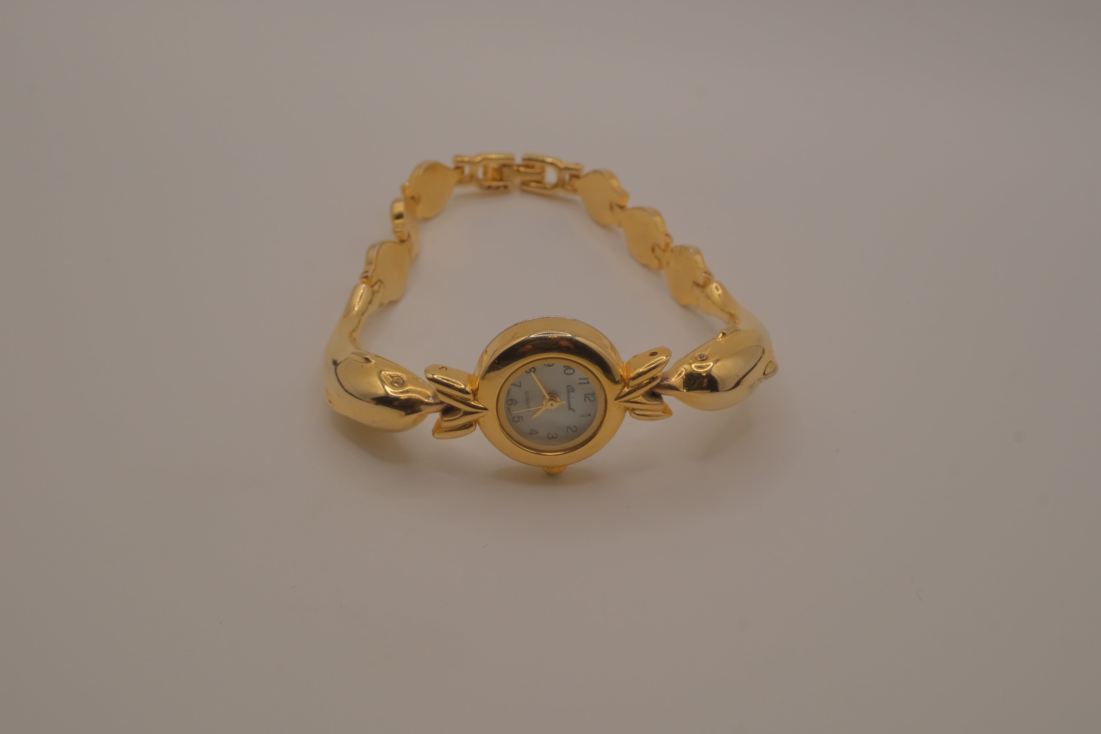 Vintage-style dolphin bracelet watch