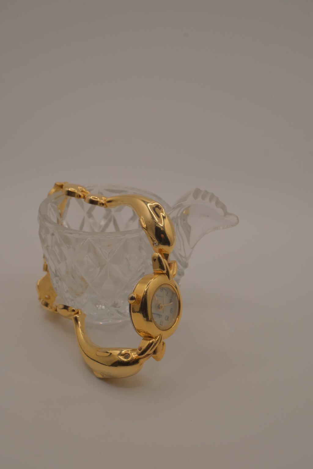 Vintage-style dolphin bracelet watch